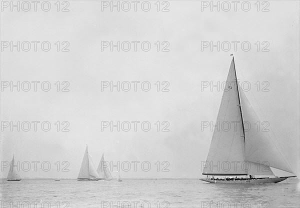 The 23-metre cutter 'Astra' sailing close-hauled, 1935. Creator: Kirk & Sons of Cowes.