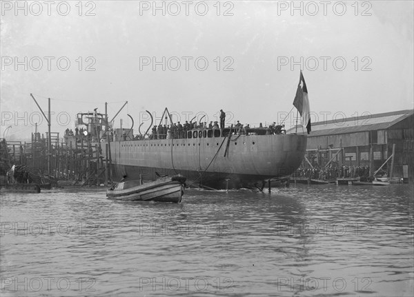 The launch of 'Almirante Simpson' at J. Samuel White shipyard, Cowes, 26th February 1914. Creator: Kirk & Sons of Cowes.