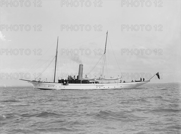 The 70 ton steam yacht 'Ombra' under way, 1914. Creator: Kirk & Sons of Cowes.