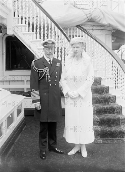 King George V and Queen Mary aboard 'HMY Victoria and Albert', 1935. Creator: Kirk & Sons of Cowes.