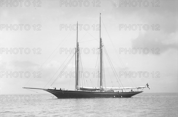 The schooner 'Allah Karim' at anchor, 1912. Creator: Kirk & Sons of Cowes.