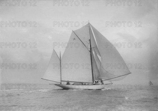 The yawl 'Celia' with full sail, 1912. Creator: Kirk & Sons of Cowes.