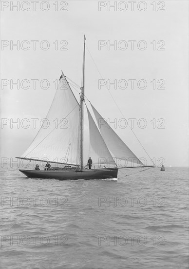 The gaff rigged cutter 'Wych' under sail, 1914. Creator: Kirk & Sons of Cowes.