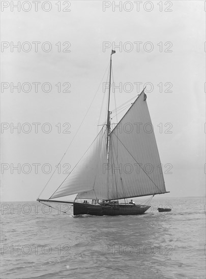 The gaff rigged cutter 'Wych' under sail, 1914. Creator: Kirk & Sons of Cowes.