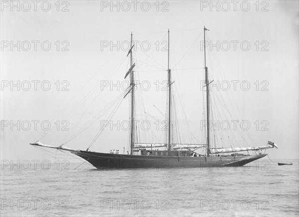 The auxiliary schooner 'La Cigale' at anchor, 1913. Creator: Kirk & Sons of Cowes.