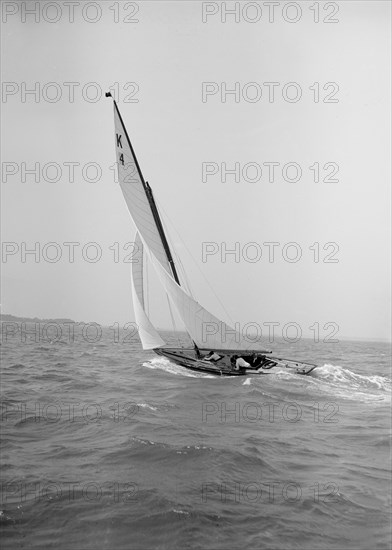 The 7 Metre 'Anitra' sailing with a good wind, 1911. Creator: Kirk & Sons of Cowes.