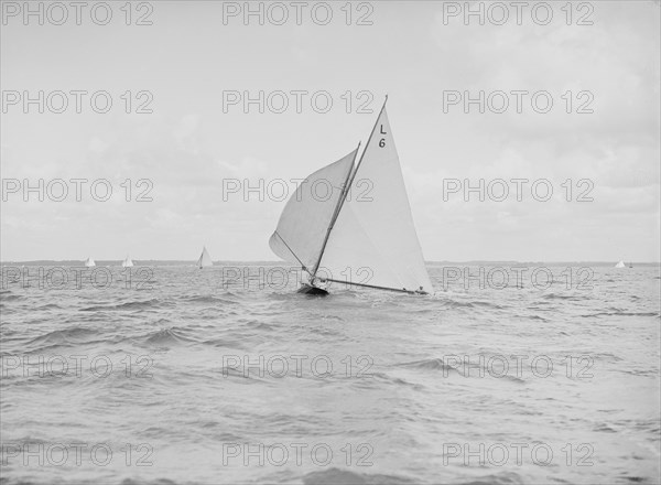 The 6 Metre Class 'The Whim' running downwind, 1912. Creator: Kirk & Sons of Cowes.