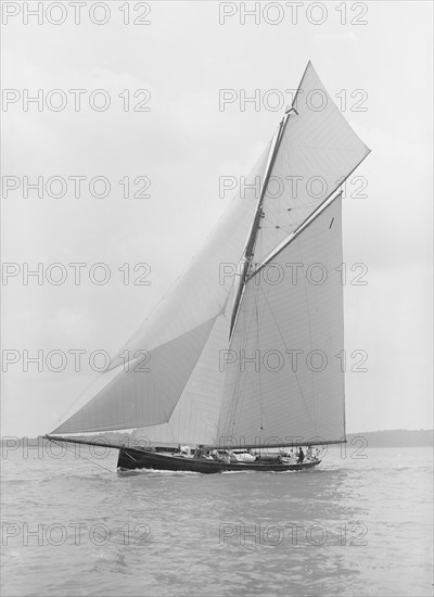 The gaff rigged cutter 'Bloodhound' sailing close-hauled, 1913. Creator: Kirk & Sons of Cowes.