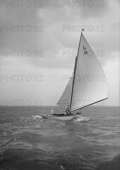 The 6 Metre 'Womba II' running downwind, 1913. Creator: Kirk & Sons of Cowes.