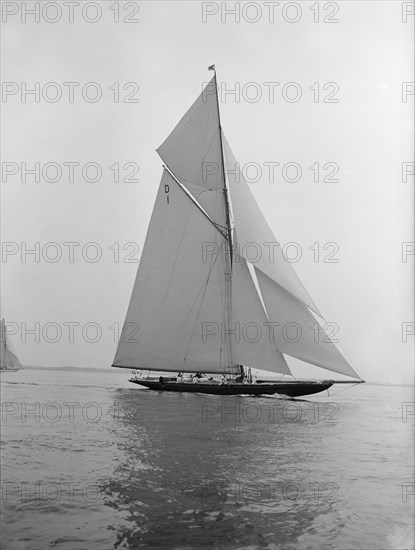 The 15 Metre sailing yacht 'Pamela' sailing close-hauled, 1913. Creator: Kirk & Sons of Cowes.