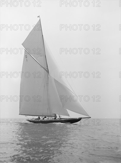 The 15 Metre sailing yacht 'Pamela' sailing close-hauled, 1913. Creator: Kirk & Sons of Cowes.