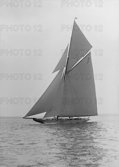 The 15 Metre 'Istria' sailing close-hauled, 1913.  Creator: Kirk & Sons of Cowes.