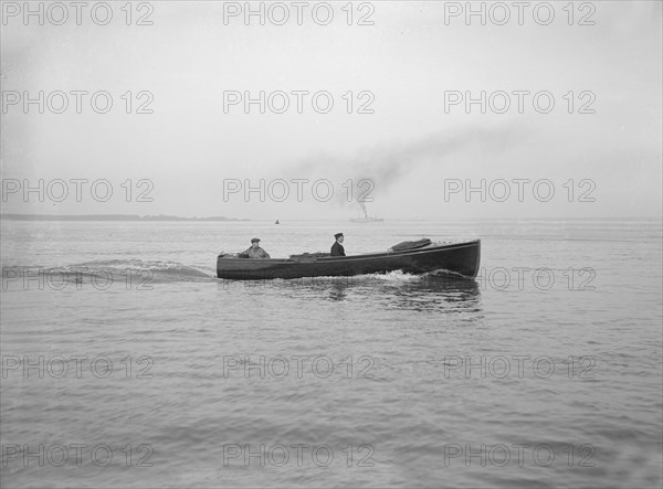 Yacht's motor launch under way, 1914. Creator: Kirk & Sons of Cowes.