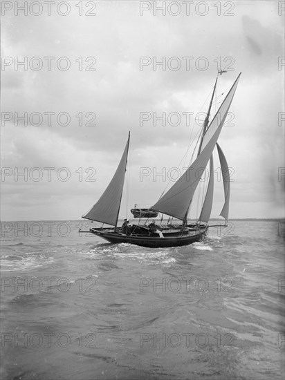 The yawl 'Moosk' under way, 1912. Creator: Kirk & Sons of Cowes.