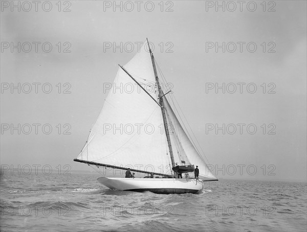 The cutter 'Grisette' sailing close-hauled, 1913. Creator: Kirk & Sons of Cowes.