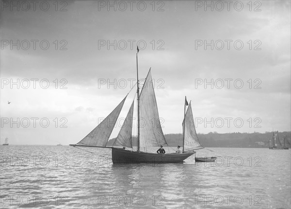 Small yawl under sail, 1912. Creator: Kirk & Sons of Cowes.