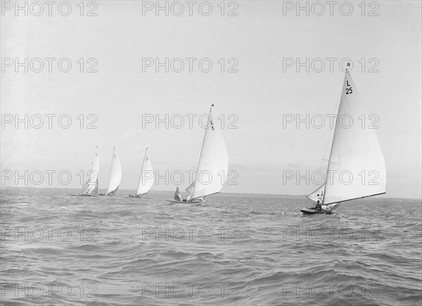 The 6 Metre 'Stella', ' Vanda ', 'Bubble', 'Wamba' and 'Lanka' racing downwind, 1914. Creator: Kirk & Sons of Cowes.