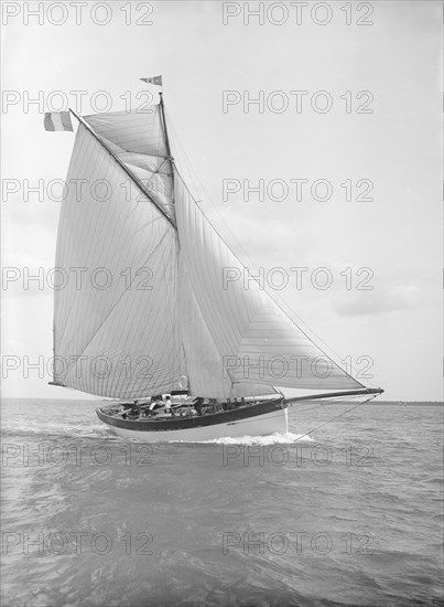 The cutter 'Nereid' sailing close-hauled, 1912. Creator: Kirk & Sons of Cowes.