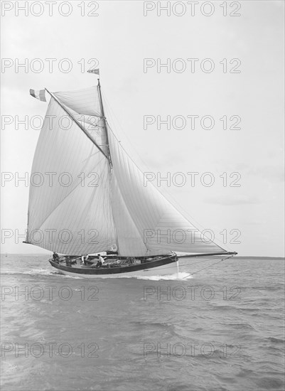 The cutter 'Nereid' sailing close-hauled, 1912. Creator: Kirk & Sons of Cowes.