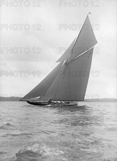 The 15 Metre sailing yacht 'Pamela' sailing close-hauled, 1913. Creator: Kirk & Sons of Cowes.
