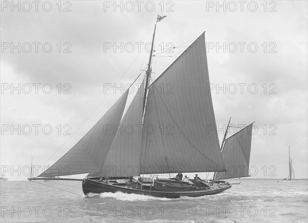 The yawl 'Moosk' under way, 1912. Creator: Kirk & Sons of Cowes.