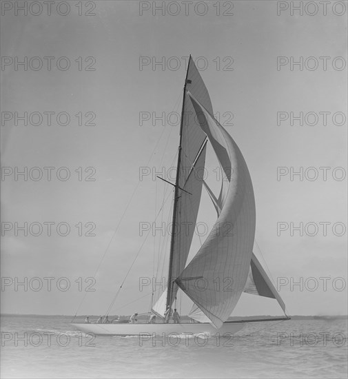 The 15 Metre 'Hispania' running downwind, 1911. Creator: Kirk & Sons of Cowes.