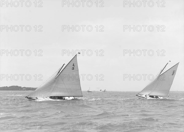 'Snowdrop' and 'Correnzia' racing up wind, 1911. Creator: Kirk & Sons of Cowes.