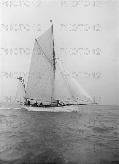 The yawl 'Colleen' under way, 1912. Creator: Kirk & Sons of Cowes.