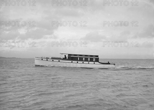 Cabin cruiser D.G.S.P., 1913. Creator: Kirk & Sons of Cowes.