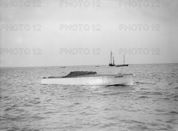 The hydroplane 'Columbine' at anchor. Creator: Kirk & Sons of Cowes.