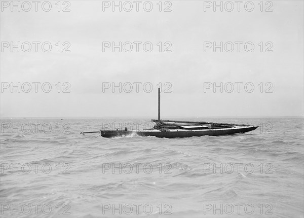 The dismasted sailing yacht 'Doris', 1912. Creator: Kirk & Sons of Cowes.