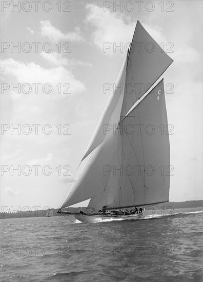 The 19-metre cutter 'Norada' sailing close reaching, 1911. Creator: Kirk & Sons of Cowes.