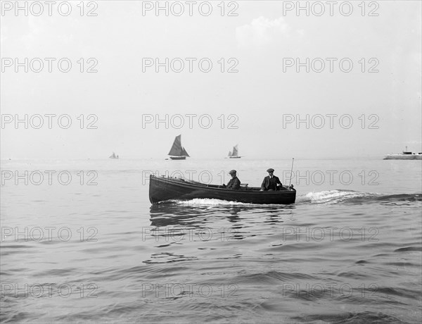 Wolseley motor launch under way, 1914. Creator: Kirk & Sons of Cowes.