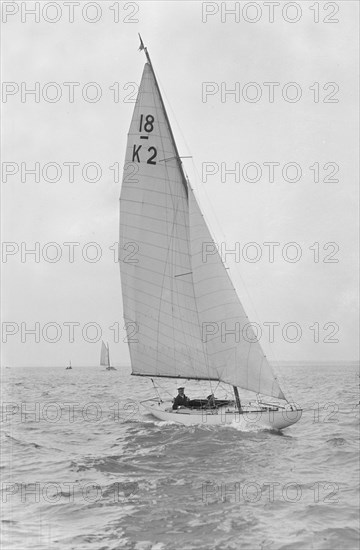 The 18-foot keelboat 'Prudence' (K2) under sail, 1922. Creator: Kirk & Sons of Cowes.