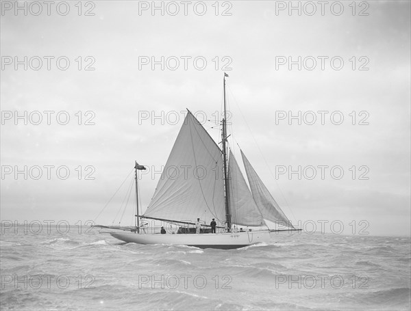 The yawl 'Colleen' under way, 1912. Creator: Kirk & Sons of Cowes.