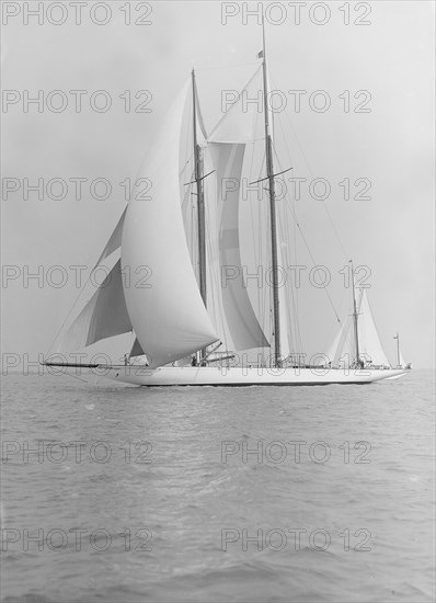 The 380 ton A Class schooner 'Margherita' sailing under spinnaker, 1913. Creator: Kirk & Sons of Cowes.