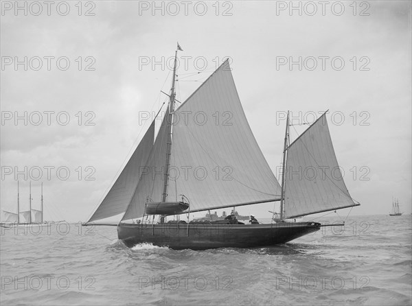 The yawl 'Moosk' under way, 1912. Creator: Kirk & Sons of Cowes.