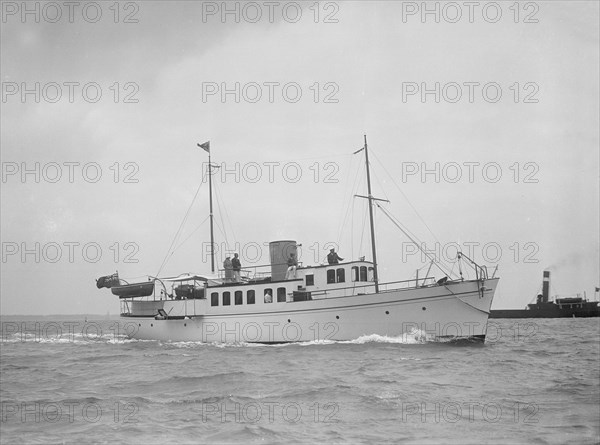 The 71 ton motor yacht 'Romana' under way, 1936. Creator: Kirk & Sons of Cowes.
