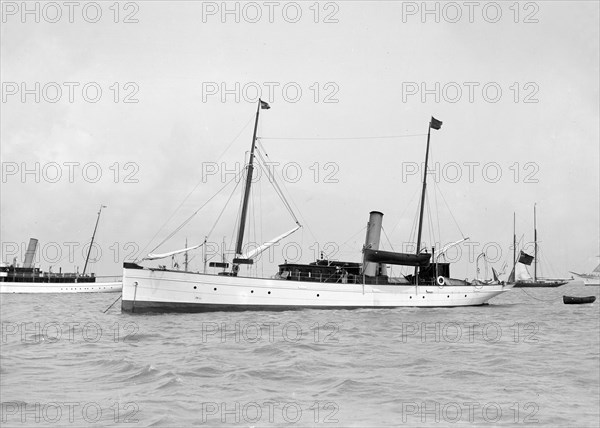 The steam yacht 'Catrina' at anchor, 1912. Creator: Kirk & Sons of Cowes.