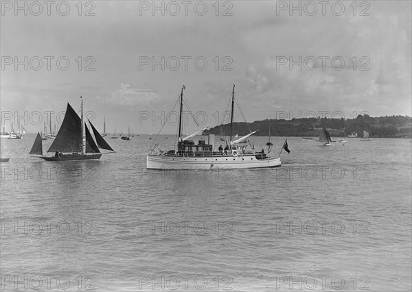 The motor yacht 'Silver Cloud' under way, 1920. Creator: Kirk & Sons of Cowes.