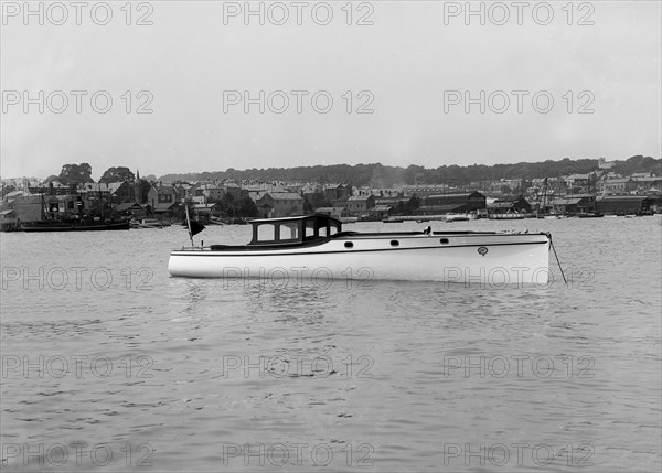 Wolseley motor launch at anchor, 1914. Creator: Kirk & Sons of Cowes.