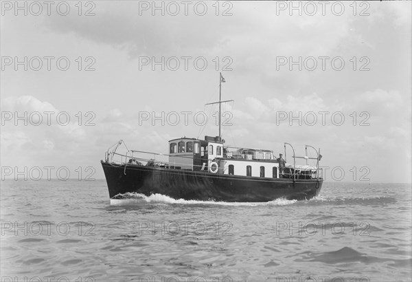 The motor yacht 'Black Arrow' under way, 1934. Creator: Kirk & Sons of Cowes.