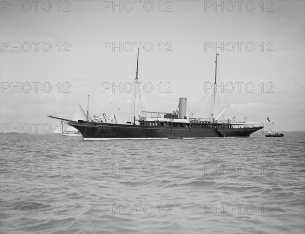 The steam yacht 'Maid of Honour' at anchor, 1911. Creator: Kirk & Sons of Cowes.