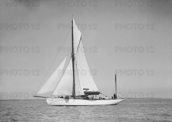 The yawl 'Suzanne' under sail, 1911. Creator: Kirk & Sons of Cowes.