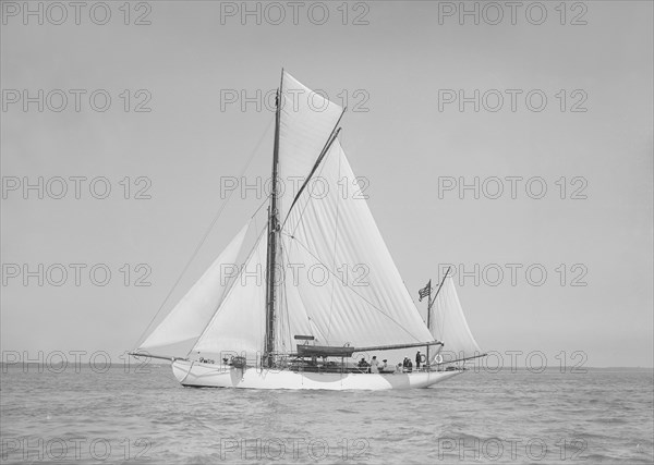 The yawl 'Suzanne' under sail, 1911. Creator: Kirk & Sons of Cowes.