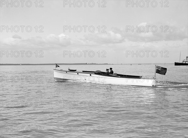 The motor launch 'Wendy' under way, 1913. Creator: Kirk & Sons of Cowes.