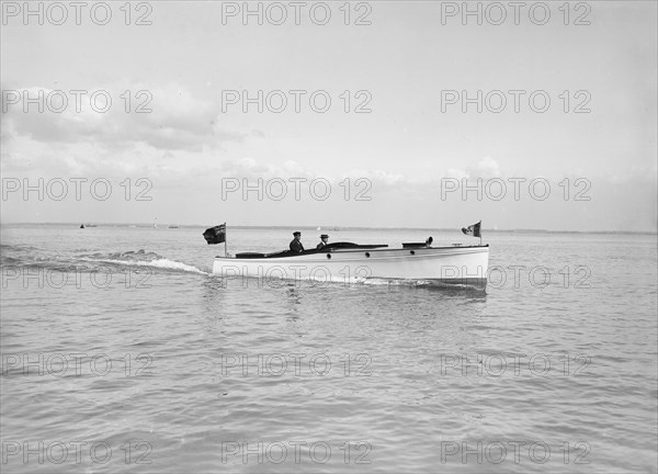 The motor launch 'Wendy' under way, 1913. Creator: Kirk & Sons of Cowes.