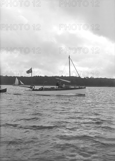 The motorboat 'Maga' under way, 1913. Creator: Kirk & Sons of Cowes.