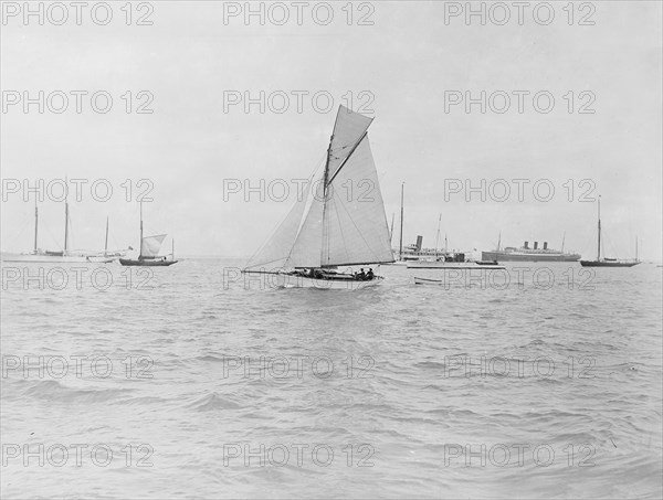 The gaff cutter 'Wigeon' under sail, 1910. Creator: Kirk & Sons of Cowes.