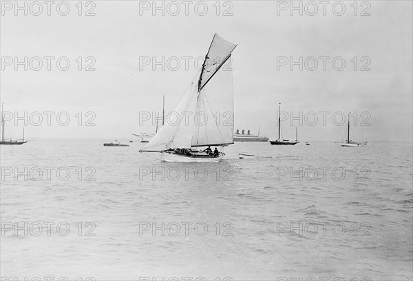 The gaff cutter 'Wigeon' under sail, 1910. Creator: Kirk & Sons of Cowes.